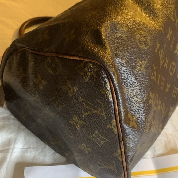 Authenticated Louis Vuitton Monogram Canvas with COA and lock and key #317 - Picture 12 of 16